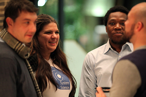 Four people having a conversation